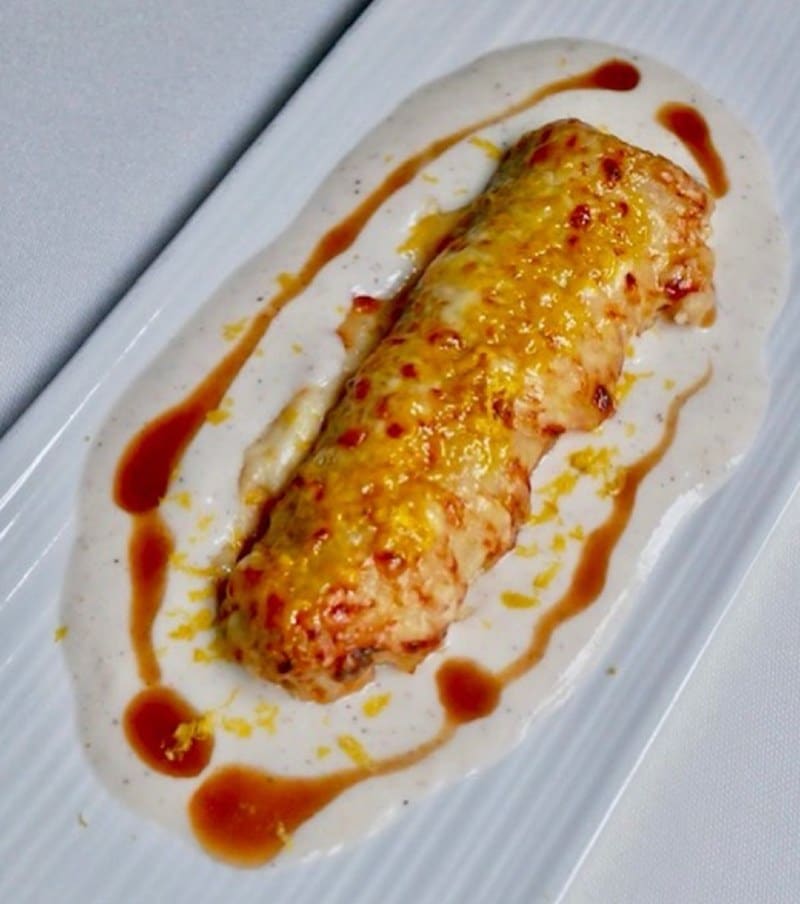 Canelón con virutas de foie y esencia de trufa Canelón Nectari Restaurant